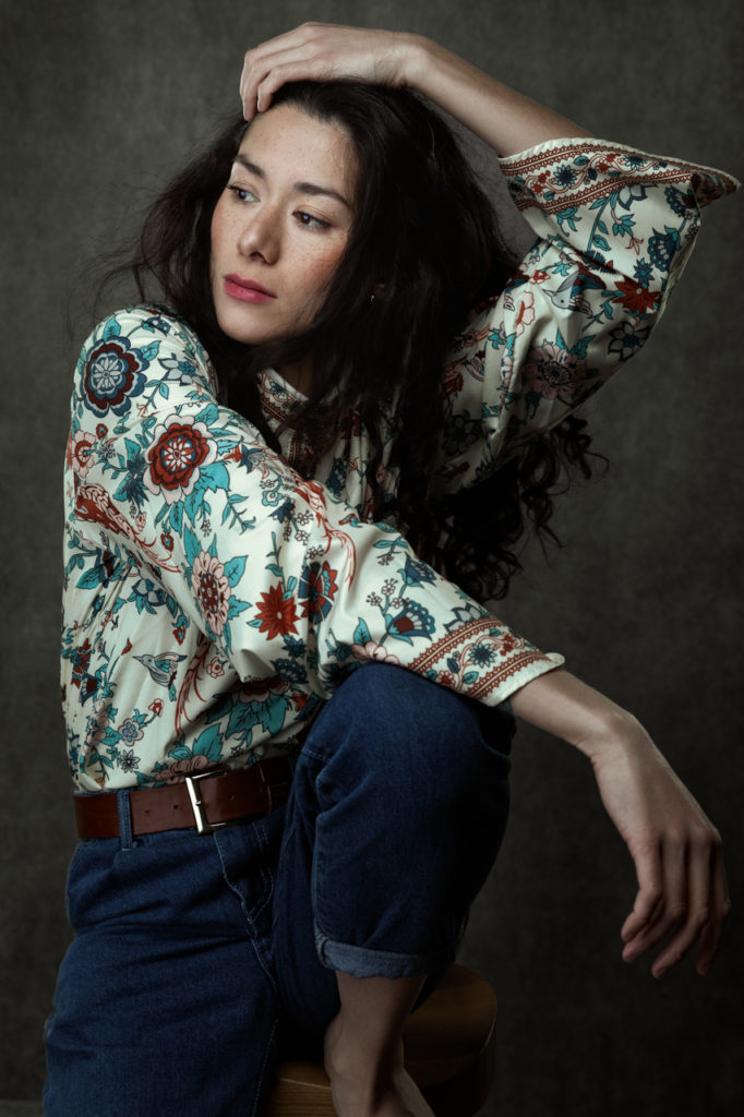 Studio portrait of a woman, Geneva, moment of contemplation
