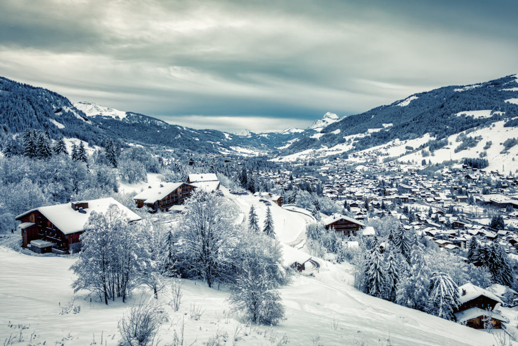 Intense winter landscape in Megeve, snowy mountains and village, December 2017