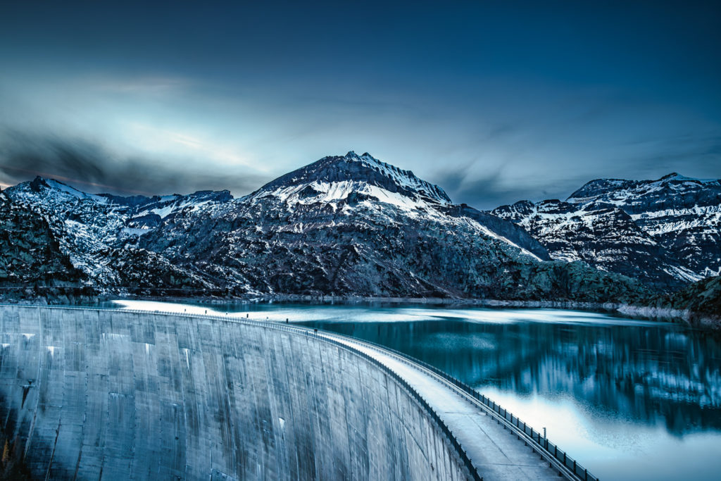 Twilight hike, icy road near Lake Emosson in Switzerland